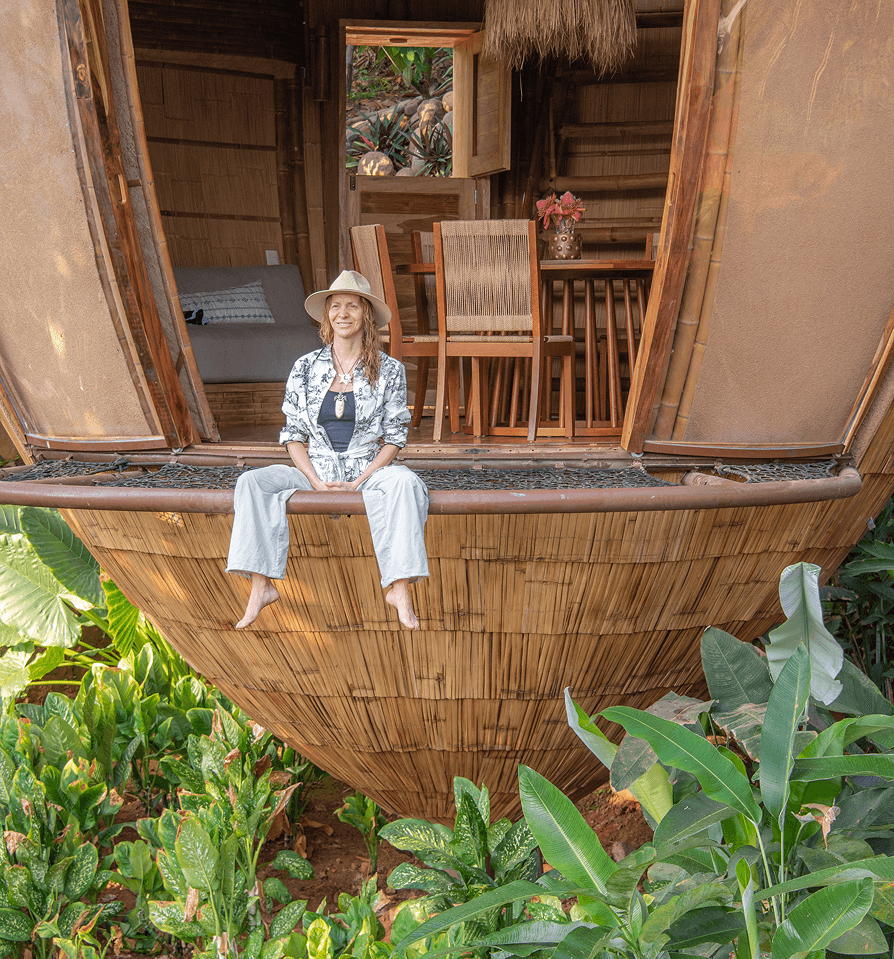 Person in bamboo structure